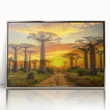 Art deco poster of African scenery with silver frame on acrylic, displaying muted earth tones.