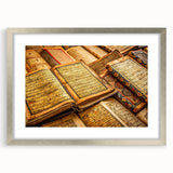Abstract art print of a stylized African scenery in muted earth tones on a framed canvas, ideal for dining room decor.