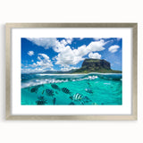 Abstract art print of a Mauritian landscape in cool blue and green tones on a framed silver canvas.