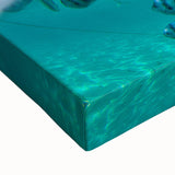 Large art depicting a black and white landscape of Mauritius on stretched canvas, suited for bedroom decor.