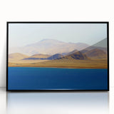 Framed acrylic print of a large abstract depiction of Tibetan landscape in muted earth tones.