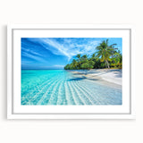 Abstract art print of Maldives scenery in muted blue and green tones on a white-framed canvas.