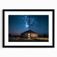 Extra large abstract art print featuring textured, colorful scenery of Mongolia, in a black frame with mat.