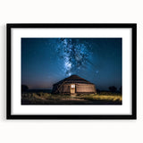 Extra large abstract art print featuring textured, colorful scenery of Mongolia, in a black frame with mat.
