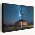 A landscape painting of the Mongolian steppe on a large stretched canvas, featuring muted earth tones.