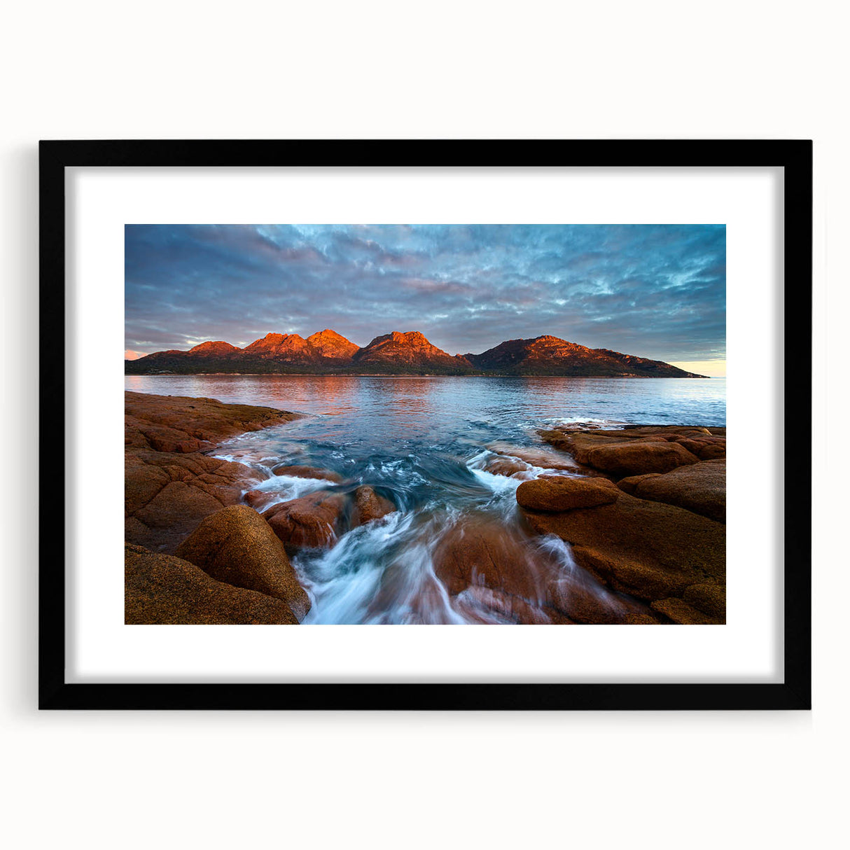 Extra large abstract art print of colorful, textured scenery, framed in black, ideal for living room decor.