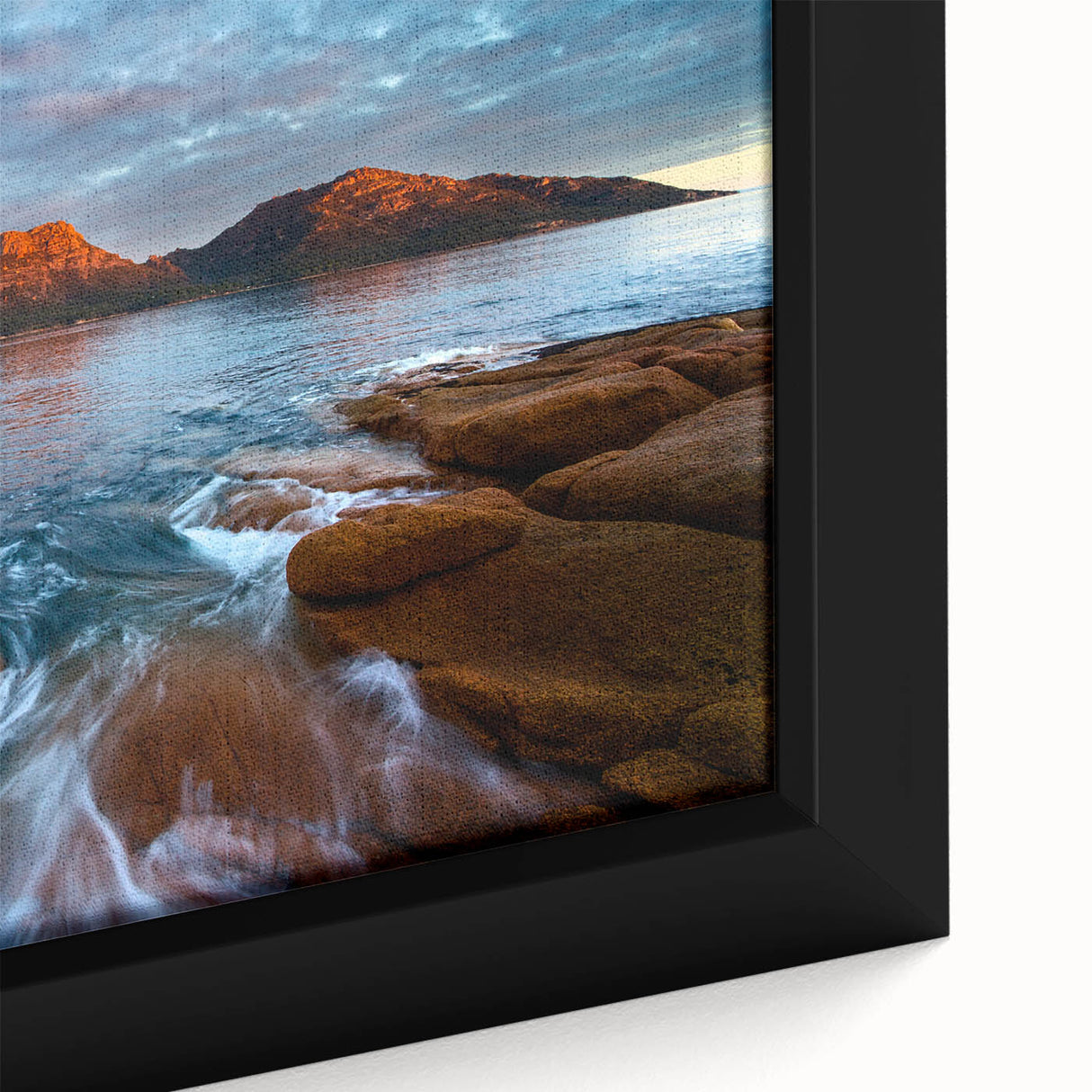 Extra large framed canvas featuring a textured depiction of a Tasmanian landscape in black with colorful art accents.