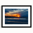 Abstract art print of a vibrant, textured Canadian landscape in a black frame, ideal for living room decor.