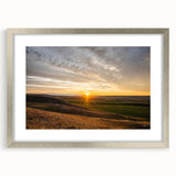 Textured abstract art print depicting a serene Saskatchewan landscape in muted earth tones, framed with a silver mat.