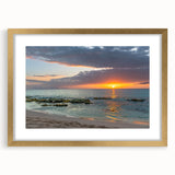 Abstract art print of Caribbean scenery in muted blue and green tones, framed in gold, ideal for dining room decor.