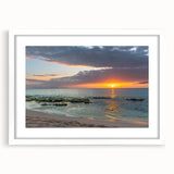 Textured abstract art print of Caribbean scenery in muted blue and green tones on a white framed mat.