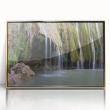 Mid-century modernist art depicting a Caribbean scenery in vibrant blues and greens on a framed acrylic.
