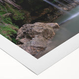 Art deco poster featuring a Caribbean scenery with vibrant blue and green tones on a rolled canvas.