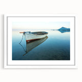 Textured abstract art print depicting a Caribbean seascape in vibrant blue and green tones on a white framed mat.