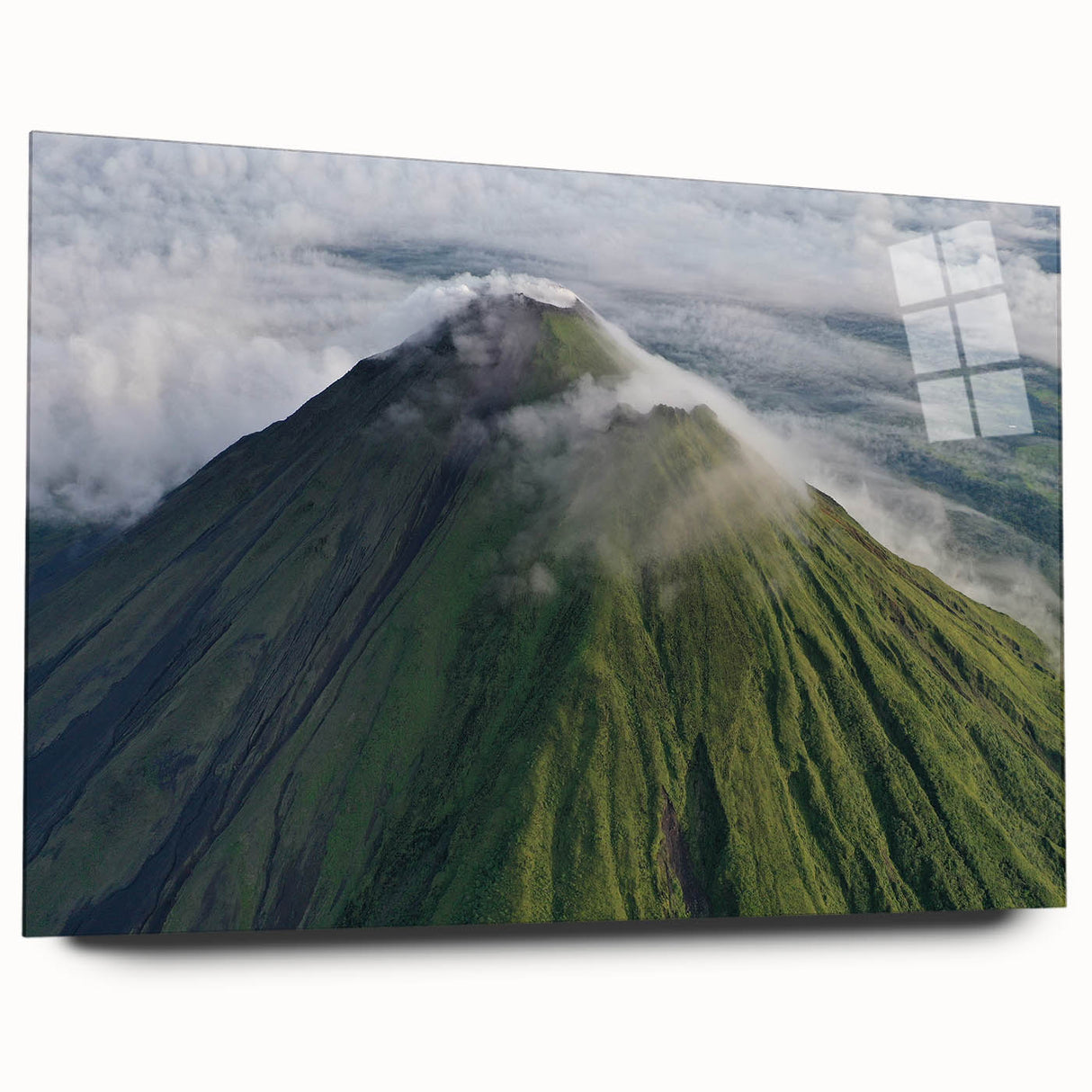 Large abstract wall art of a Costa Rican scenery in vibrant green and blue tones on acrylic glass.