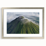 Textured abstract art print of a Central American landscape in muted earth tones on a framed silver mat.