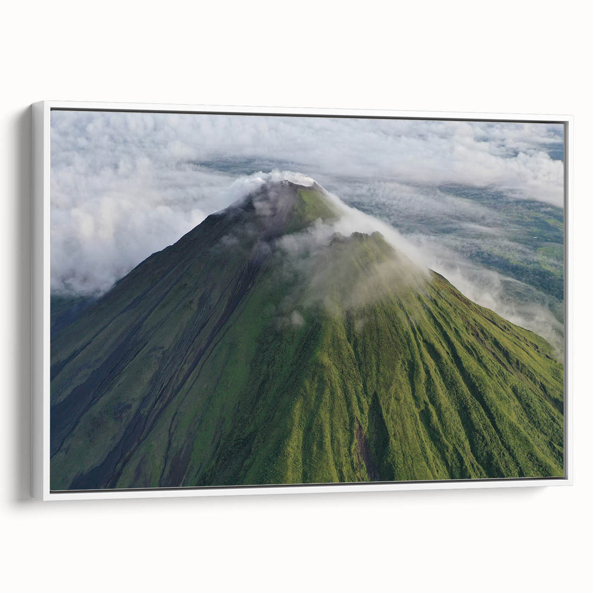 Vintage poster art of a Costa Rican landscape on a framed canvas, featuring vibrant green and blue tones.