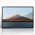 Large abstract wall art of a Central American landscape in muted earth tones, framed in black acrylic.