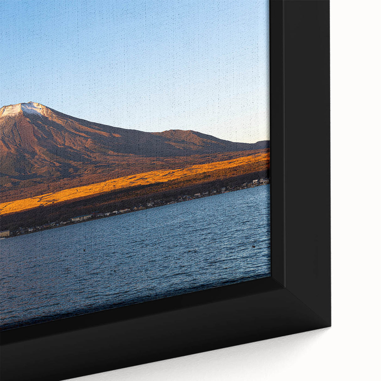 Large art featuring a black and white landscape painting of Central America on a framed canvas, suitable for bedroom decor.