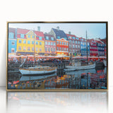 Art deco poster depicting a serene European landscape in muted gold and blue tones, framed acrylic.