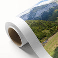 Art deco poster of the French Alps in muted blue and white tones on rolled canvas, ideal for nursery wall art.