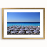 Abstract art print of Nice, France in muted blue and gold tones on a framed canvas, ideal for dining room decor.