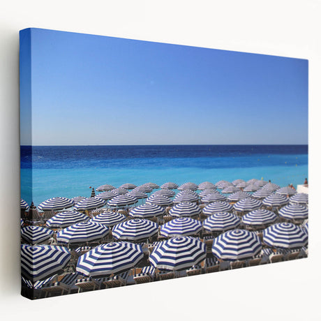 Large canvas print of a scenic view of Nice, France, with muted blue and beige tones, ideal for kitchen wall art.