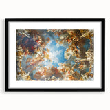 Abstract art print of Versailles scenery in vibrant colors on a large textured canvas, framed in black.