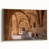 Framed canvas depicting a vintage-style landscape of Rhodes, Greece in muted gold and black, ideal for bedroom wall art.