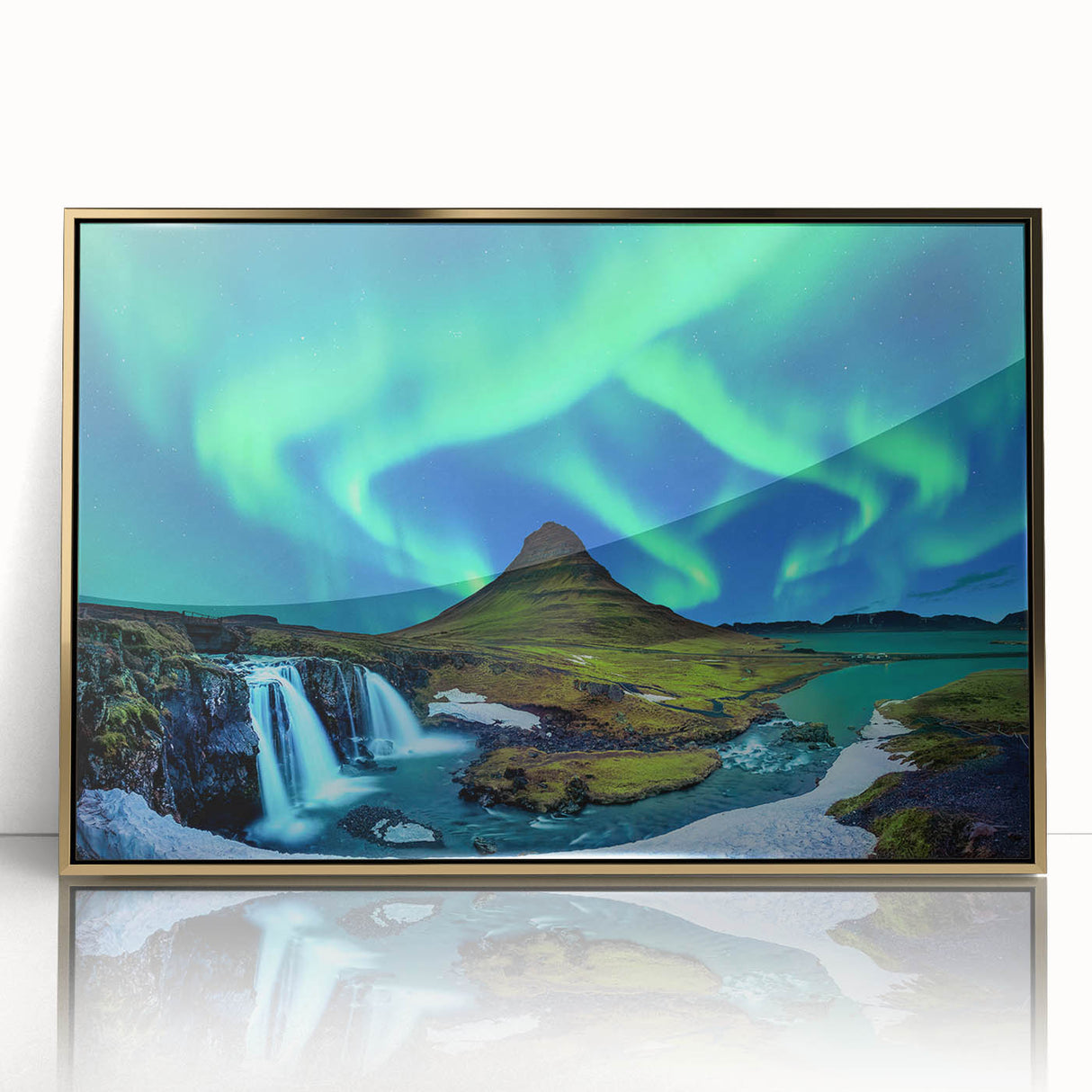 Acrylic print of a serene Icelandic landscape in muted blue and green tones, framed in gold.