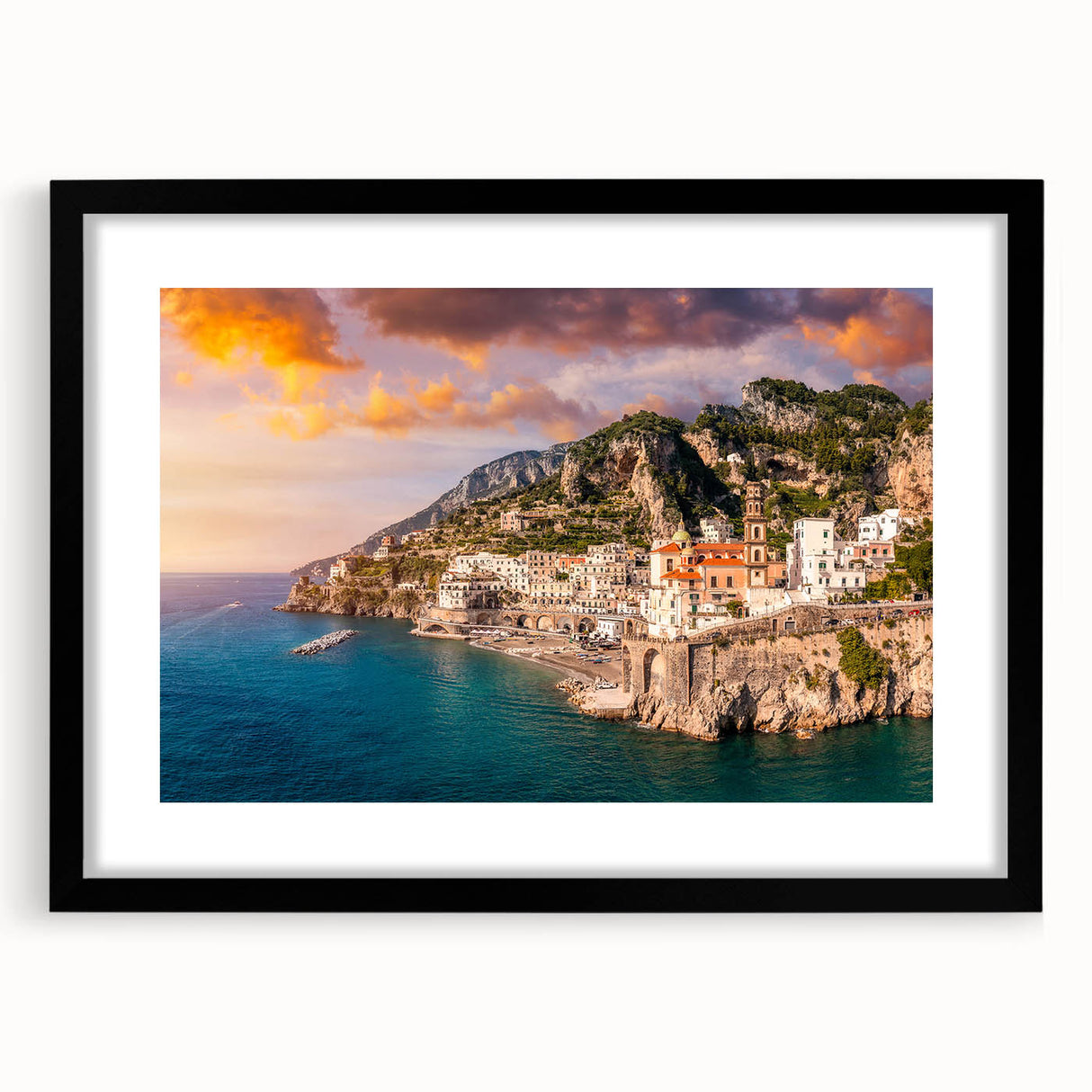 Colorful abstract art print of the Amalfi Coast in a black frame with mat, ideal for living room decor.