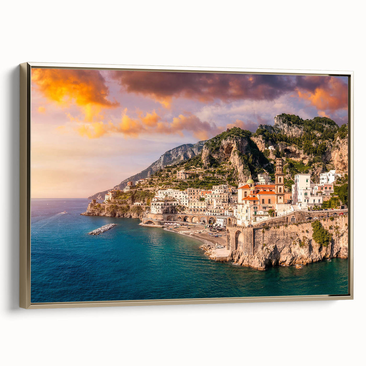 Framed canvas of Amalfi Coast landscape in vintage poster style, featuring black and gold tones, ideal for bedroom wall art.
