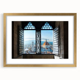 Abstract art print of Florence skyline in muted gold and beige tones on a framed canvas, suitable for dining room decor.