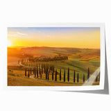 Rolled print of a Tuscan landscape with vibrant green fields and a clear blue sky, ideal for dining room wall art.