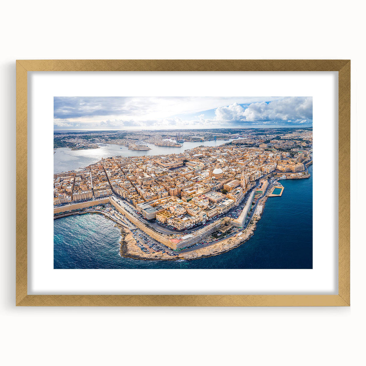 Abstract art print of a European Malta scenery in muted earth tones on a gold-framed mat, suitable for dining room decor.