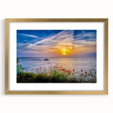Abstract art print of a European landscape in muted blues and greens, framed in gold.