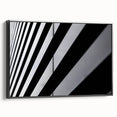 Black and white framed canvas of Amsterdam landscape with vintage poster art style, suitable for bedroom decor.