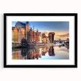 Textured abstract art print depicting a colorful European landscape on a large framed canvas, suitable for living room decor.