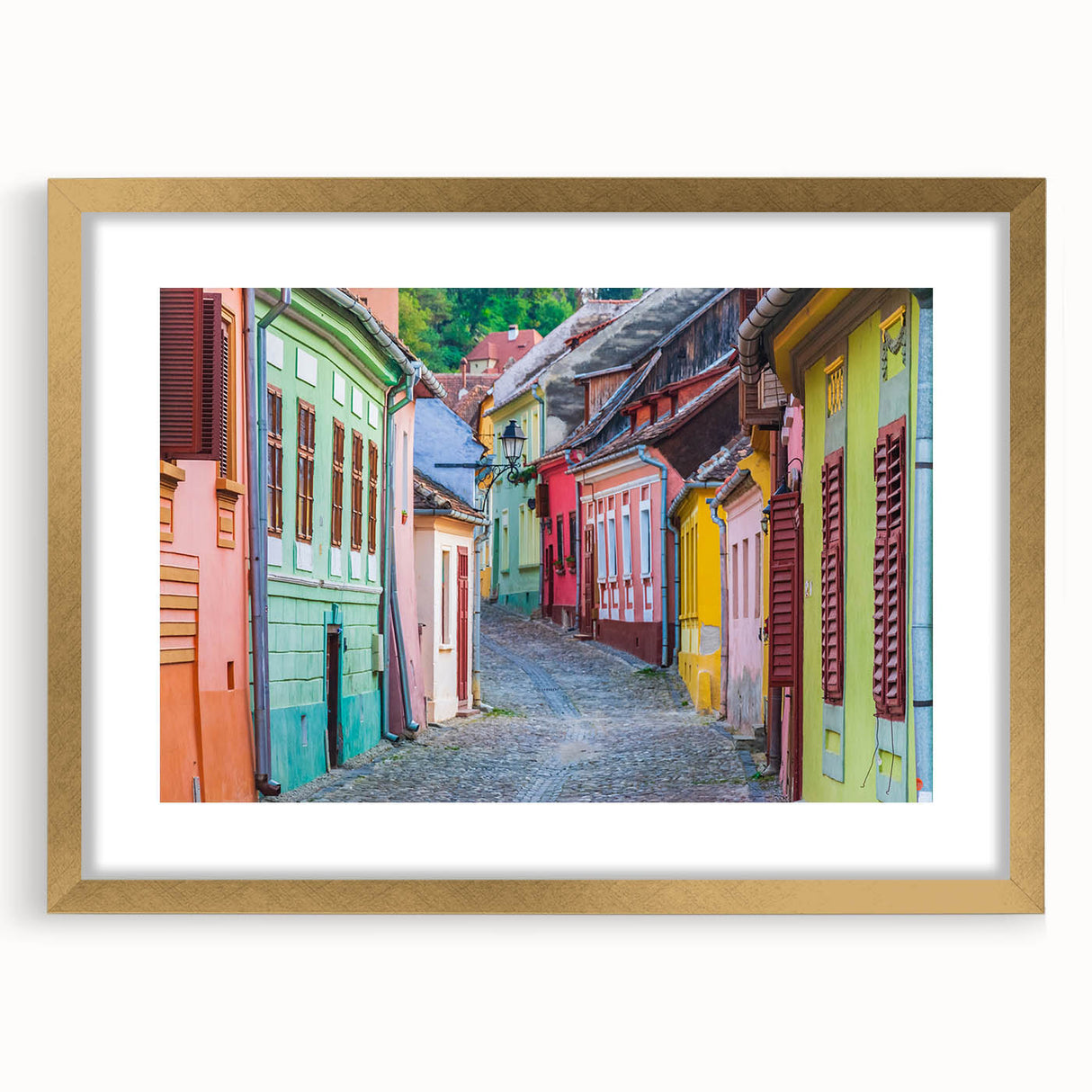 Abstract art print of a European landscape in muted earth tones, framed in gold, suitable for dining room decor.