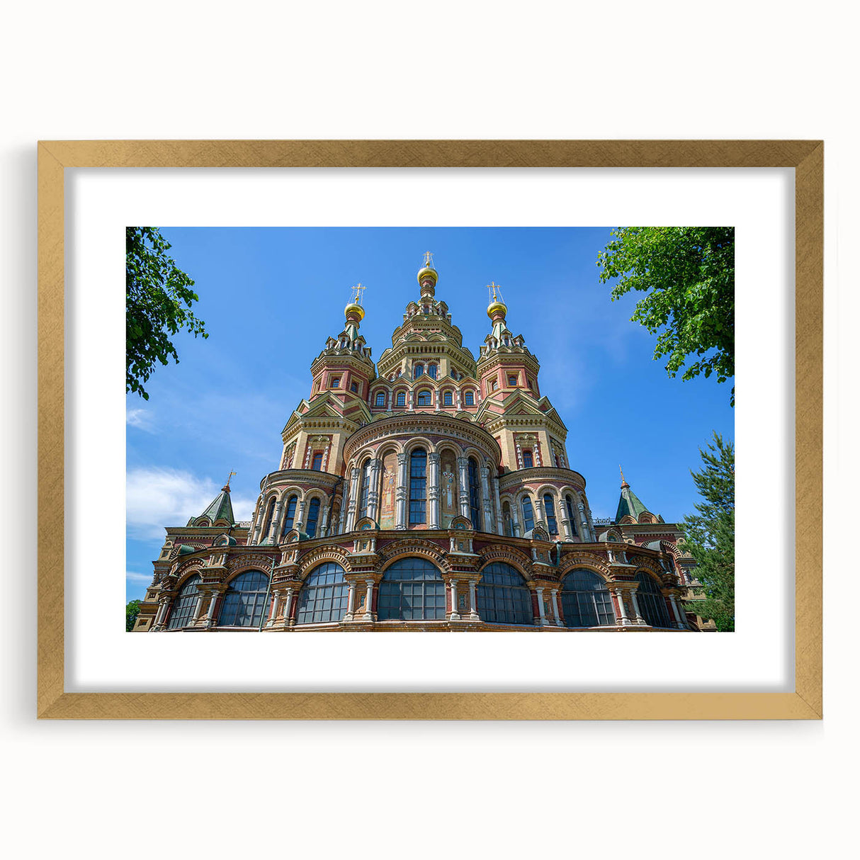 Abstract art print of a European cityscape in muted gray and blue tones, framed in gold, ideal for dining room decor.
