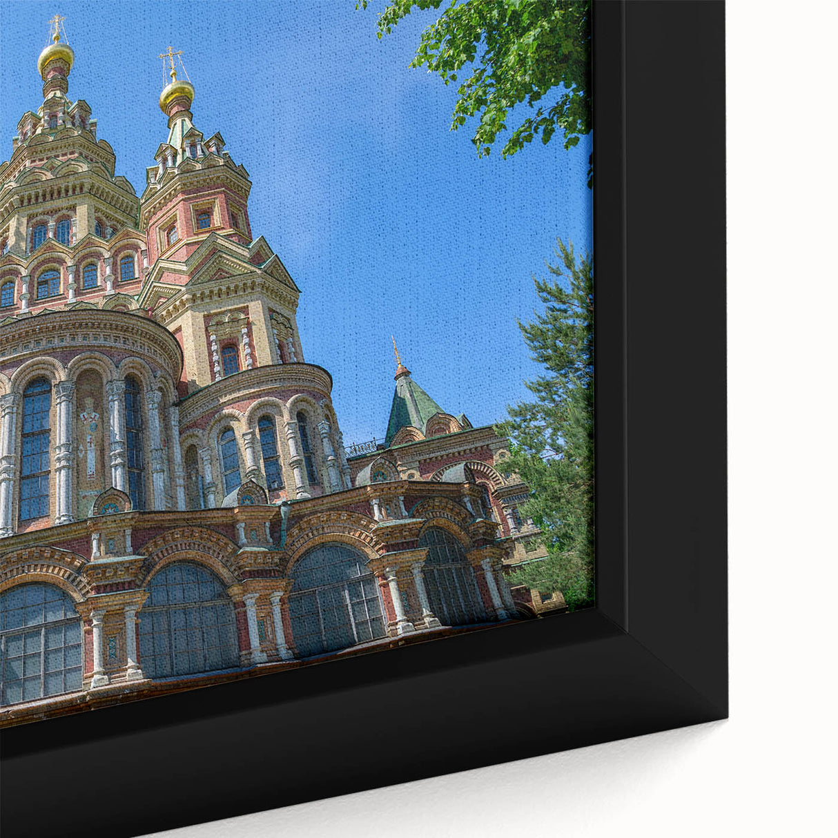 Extra large framed canvas featuring a textured depiction of a European cityscape in black with colorful accents.