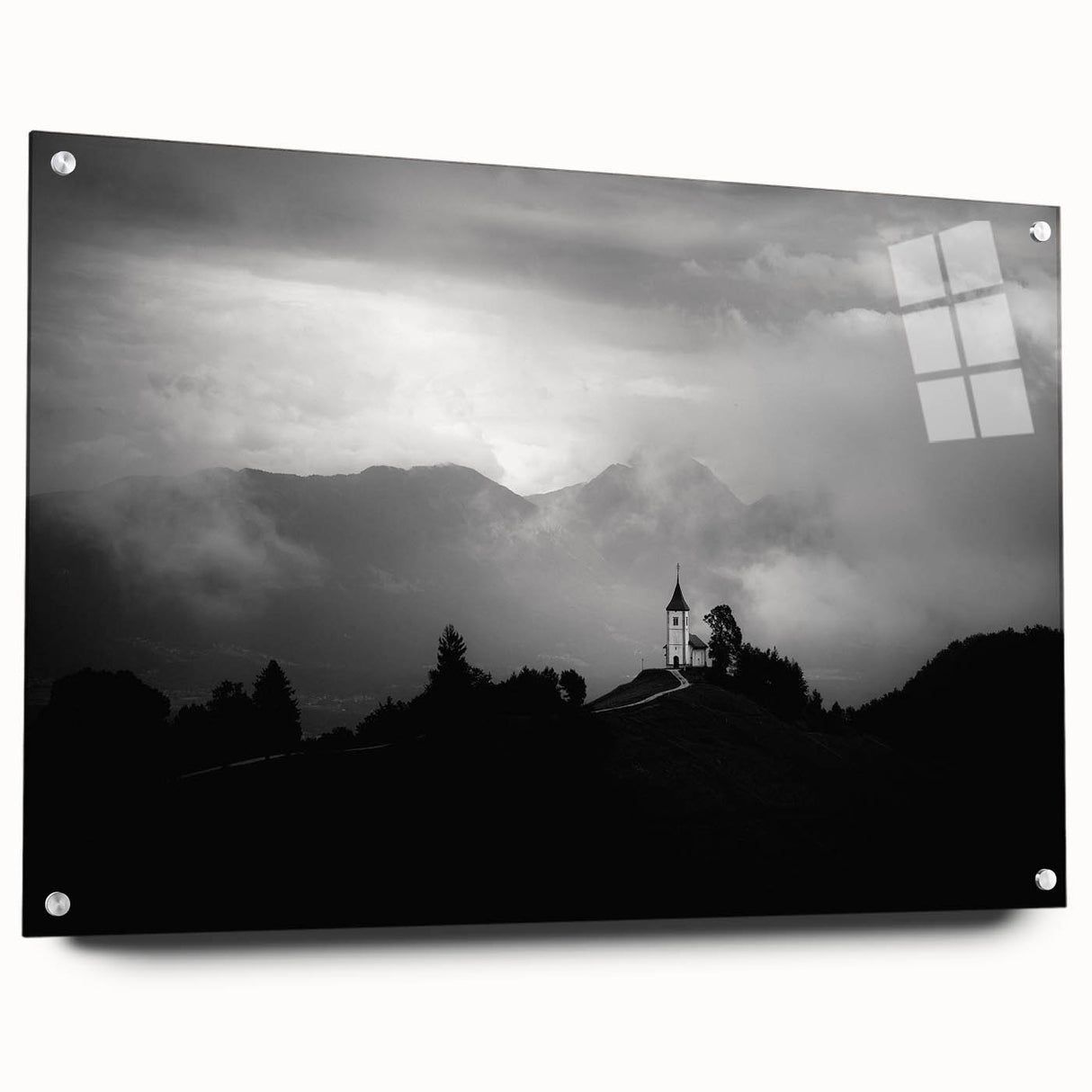 Acrylic glass print of a Slovenian landscape, featuring lush greenery and a calm lake.