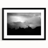 Textured abstract art print of colorful European scenery, framed in black, ideal for living room decor.