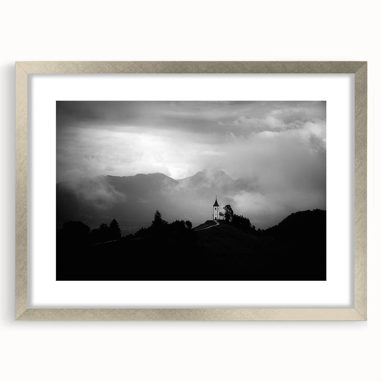 Abstract art print of a European Slovenian landscape in muted earth tones, framed in silver.