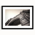 Extra large abstract art print of Barcelona with vibrant, colorful textures on a framed black matte canvas.