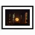 Extra large abstract art print of Madrid scenery in vibrant colors on a black framed canvas, ideal for living room decor.