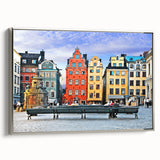 Framed canvas of a vintage-style landscape painting featuring a serene Swedish scenery in muted earth tones.