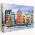 Scenic view of a Swedish landscape on a large stretched canvas, featuring muted green and blue tones.