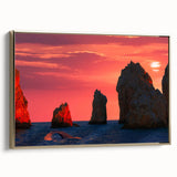 Framed canvas depicting a vintage-style landscape painting of Cabo San Lucas, featuring muted earth tones.
