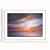 Abstract art print of Cancun scenery in muted blue and white tones, framed with a white mat, suitable for dining room decor.